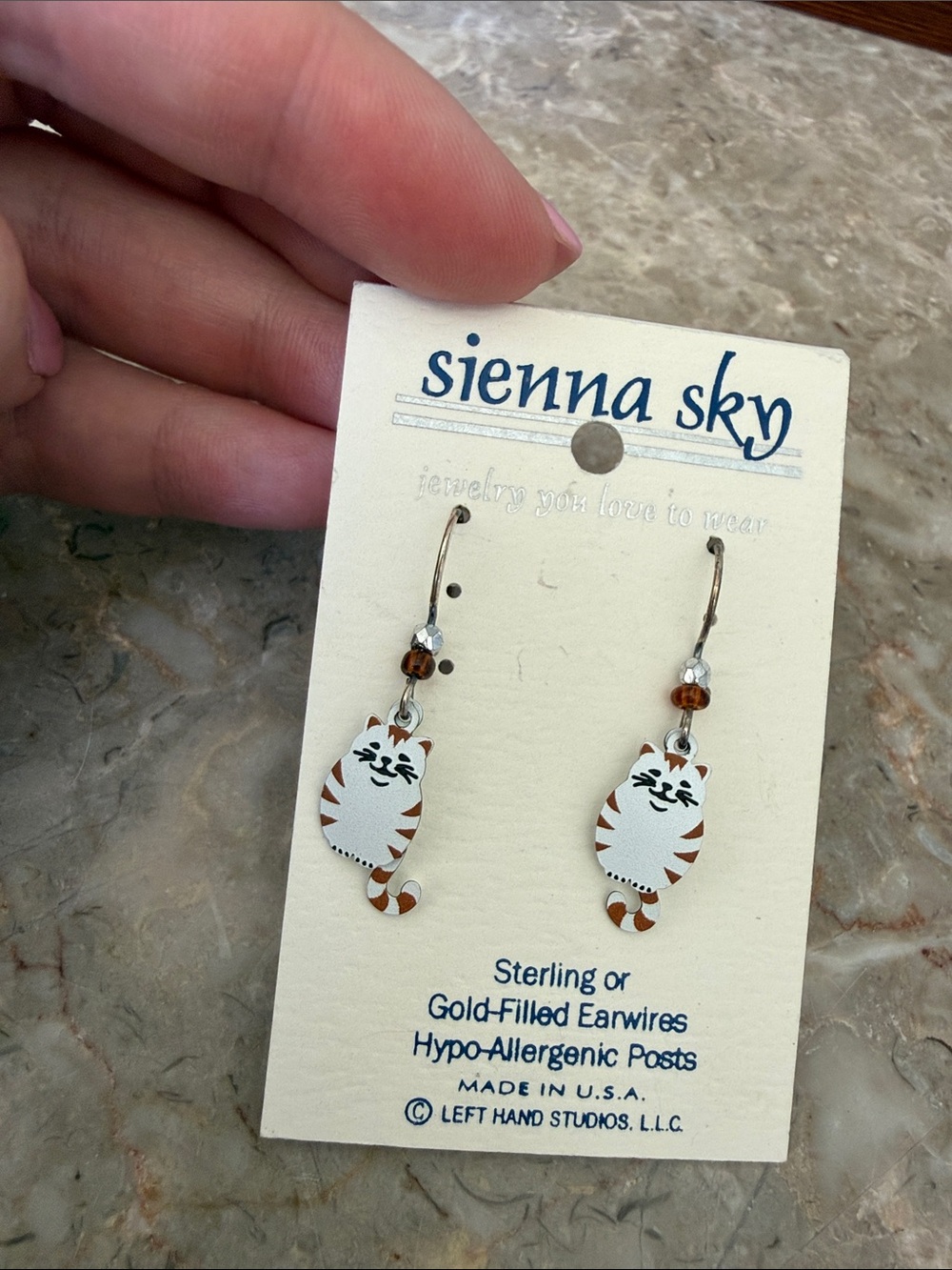 Sienna Sky White and Brown Kitty Dangle Earrings
